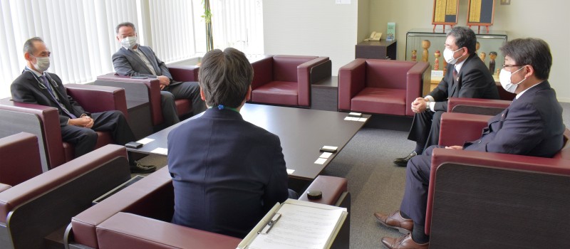 茨城県社労士会と筑波銀行様の業務提携調印式の会合場面